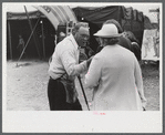 Tintype photographer trying to make a sale at the Champlain Valley Exposition, Essex Junction, Vermont.