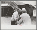 Tintype photographer trying to make a sale at the Champlain Valley Exposition, Essex Junction, Vermont.