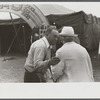 Tintype photographer trying to make a sale at the Champlain Valley Exposition, Essex Junction, Vermont.