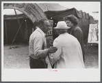 Tintype photographer trying to make a sale at the Champlain Valley Exposition, Essex Junction, Vermont.