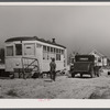 Old street car converted into living quarters for family of four. They were born and raised in Fayetteville, but could not get a place to stay. Husband works at Fort Bragg, North Carolina. Just outside of Fayetteville, North Carolina.