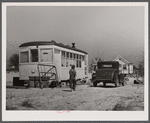Old street car converted into living quarters for family of four. They were born and raised in Fayetteville, but could not get a place to stay. Husband works at Fort Bragg, North Carolina. Just outside of Fayetteville, North Carolina.