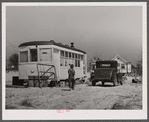 Old street car converted into living quarters for family of four. They were born and raised in Fayetteville, but could not get a place to stay. Husband works at Fort Bragg, North Carolina. Just outside of Fayetteville, North Carolina.