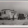 Old street car converted into living quarters for family of four. They were born and raised in Fayetteville, but could not get a place to stay. Husband works at Fort Bragg, North Carolina. Just outside of Fayetteville, North Carolina.