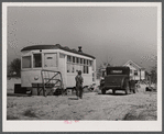 Old street car converted into living quarters for family of four. They were born and raised in Fayetteville, but could not get a place to stay. Husband works at Fort Bragg, North Carolina. Just outside of Fayetteville, North Carolina.