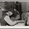 Worker from Fort Bragg and his family living in an old streetcar. He is building for their "new home." Came a hundred miles for this job and expect to move on soon. Near Manchester, North Carolina.