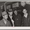 Migratory construction workers in a general store near Fort Bragg, North Carolina.