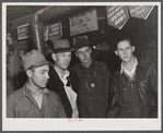 Migratory construction workers in a general store near Fort Bragg, North Carolina.