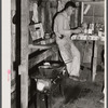 Migratory worker employed at Fort Bragg living in this old barn near Manchester, North Carolina.