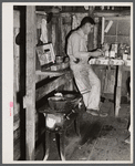 Migratory worker employed at Fort Bragg living in this old barn near Manchester, North Carolina.