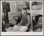 Migratory workers who work at Fort Bragg in bunkhouse where several of them live near Spartanburg, South Carolina.