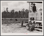 Some families who moved out of the Santee-Cooper Basin bought land that had to be cleared before it could be farmed. Near Bonneau, South Carolina