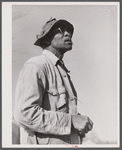 Mr. L. A. Anderson, who owned a few acres of land in the Camp Croft area. Although almost totally blind, he was repairing an old house to move into temporarily. Near Whitestone, South Carolina.