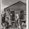 Installing a pump at a house rebuilt for a family who had moved out of the Santee-Cooper basin. Near Bonneau, South Carolina.