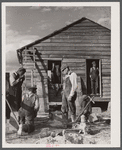 Installing a pump at a house rebuilt for a family who had moved out of the Santee-Cooper basin. Near Bonneau, South Carolina.