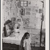 Interior of a one room shack in a settlement of Negro farmers who had moved out of the Santee-Cooper basin. Near Bonneau, South Carolina.