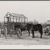 Tearing down a house to be moved out of the Santee Cooper basin near Bonneau, South Carolina.