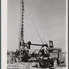 Digging a well for families moving into FSA (Farm Security Administration) prefabricated houses from the Camp Croft area. Pacolet, South Carolina region.