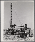 Digging a well for families moving into FSA (Farm Security Administration) prefabricated houses from the Camp Croft area. Pacolet, South Carolina region.