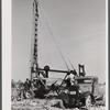 Digging a well for families moving into FSA (Farm Security Administration) prefabricated houses from the Camp Croft area. Pacolet, South Carolina region.