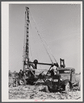 Digging a well for families moving into FSA (Farm Security Administration) prefabricated houses from the Camp Croft area. Pacolet, South Carolina region.
