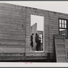 Putting up an inside wall in prefabricated houses for farmers moving out of the Camp Croft area. Pacolet, South Carolina.