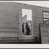 Putting up an inside wall in prefabricated houses for farmers moving out of the Camp Croft area. Pacolet, South Carolina.