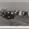Putting up a prefabricated house, showing sections to be used in construction. Pacolet, South Carolina.