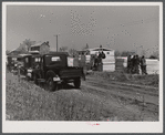 Putting up a prefabricated house, showing sections to be used in construction. Pacolet, South Carolina.