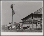 Making electricity available for prefabricated houses built by FSA (Farm Security Administration) for farmers moving out of Camp Croft area. Pacolet, South Carolina region.