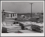 Building prefabricated houses for farmers who had to move out of the Camp Croft area. "Ready made" sections are in foreground. Pacolet, South Carolina region.