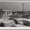 Building prefabricated houses for farmers who had to move out of the Camp Croft area. "Ready made" sections are in foreground. Pacolet, South Carolina region.