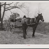 Tenant farmer moving the last load of his belongings out of the Camp Croft area near Pacolet, South Carolina.