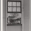 Old tenant house seen thru window of the prefabricated houses on the FSA (Farm Security Administraton) project in the Pacolet, South Carolina region.