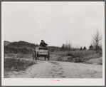 Tenant farmer taking the last load of his belongings out of the Camp Croft area. Near Pacolet South Carolina.
