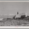 Sections of prefabricated house being unloaded from truck at the FSA (Farm Security Administration) project in Pacolet, South Carolina.