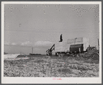 Sections of prefabricated house being unloaded from truck at the FSA (Farm Security Administration) project in Pacolet, South Carolina.