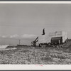 Sections of prefabricated house being unloaded from truck at the FSA (Farm Security Administration) project in Pacolet, South Carolina.