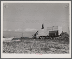 Sections of prefabricated house being unloaded from truck at the FSA (Farm Security Administration) project in Pacolet, South Carolina.