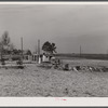 Landscape in Camp Croft showing trailer family moving out. Near Pacolet, South Carolina.