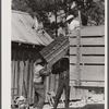 A family moving out of the Spartanburg Army camp area. Near Spartanburg, South Carolina.