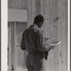 Foreman studying blueprints for prefabricated houses at the FSA (Farm Security Administration) project in Pacolet, South Carolina for farmers moving out of the Camp Croft area.