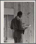 Foreman studying blueprints for prefabricated houses at the FSA (Farm Security Administration) project in Pacolet, South Carolina for farmers moving out of the Camp Croft area.