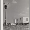 Making electricity available for the prefabricated houses at the FSA (Farm Security Administration) project in Pacolet, South Carolina for farmers moving out of the Camp Croft area.