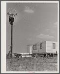 Making electricity available for the prefabricated houses at the FSA (Farm Security Administration) project in Pacolet, South Carolina for farmers moving out of the Camp Croft area.