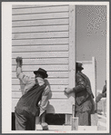 Putting up a wall in one of the prefabricated houses being built at Pacolet, South Carolina for farmers moved out of Camp Croft area.