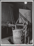 Tapping a furnace in the foundry of the Farrell-Birmingham Corporation. Ansonia, Connecticut.