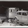 Trailer and car occupied by Mr. and Mrs. Clyde Burton (refer to caption #42581). Bath, Maine.