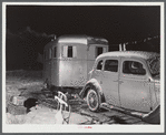Trailer and car occupied by Mr. and Mrs. Clyde Burton (refer to caption #42581). Bath, Maine.