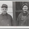 Portrait of two workers at the Bath Iron Works. Bath, Maine.